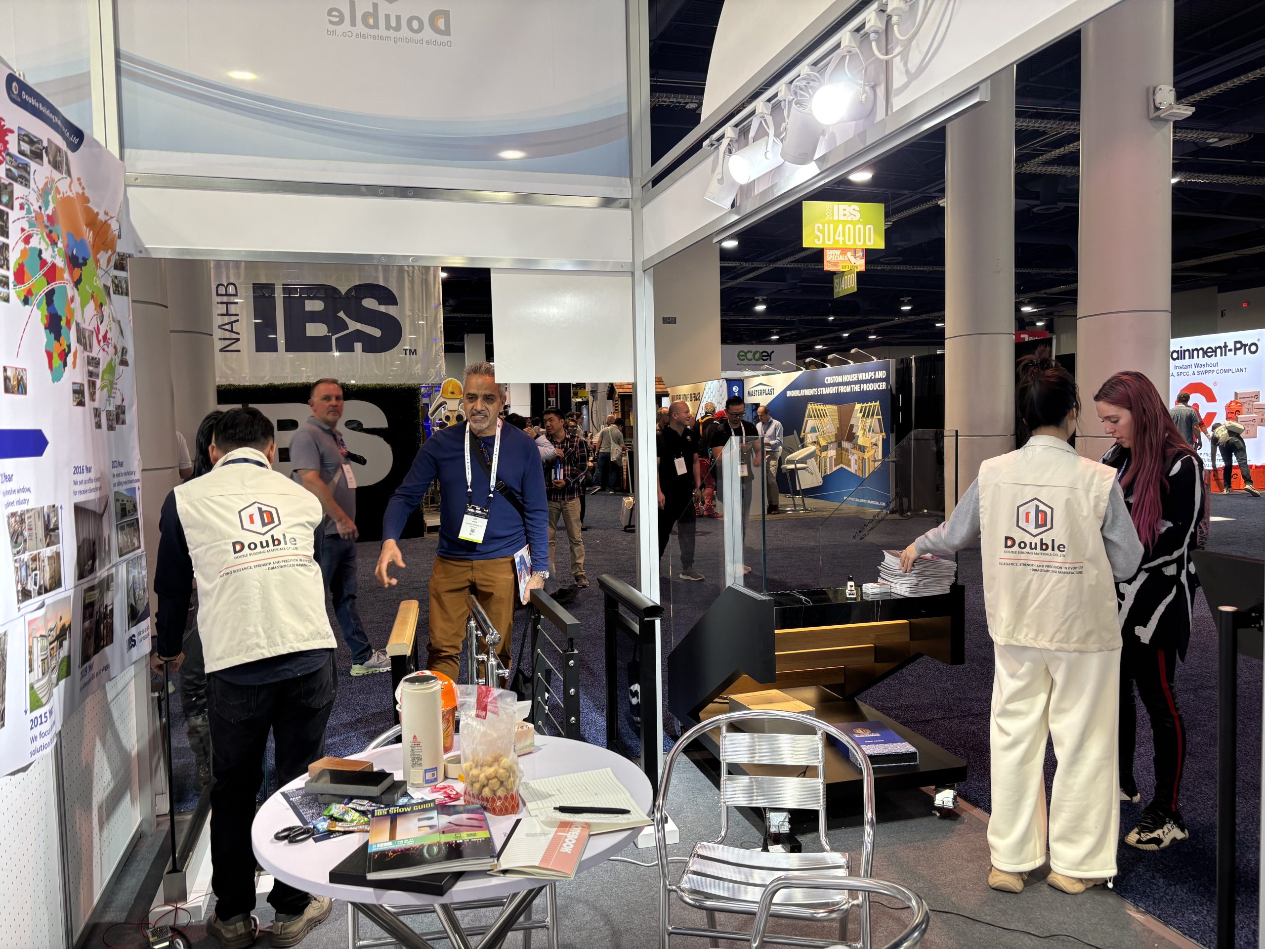 IBS 2025 follow up booth detail — glass railing samples and IRC/IBC engineering documentation
