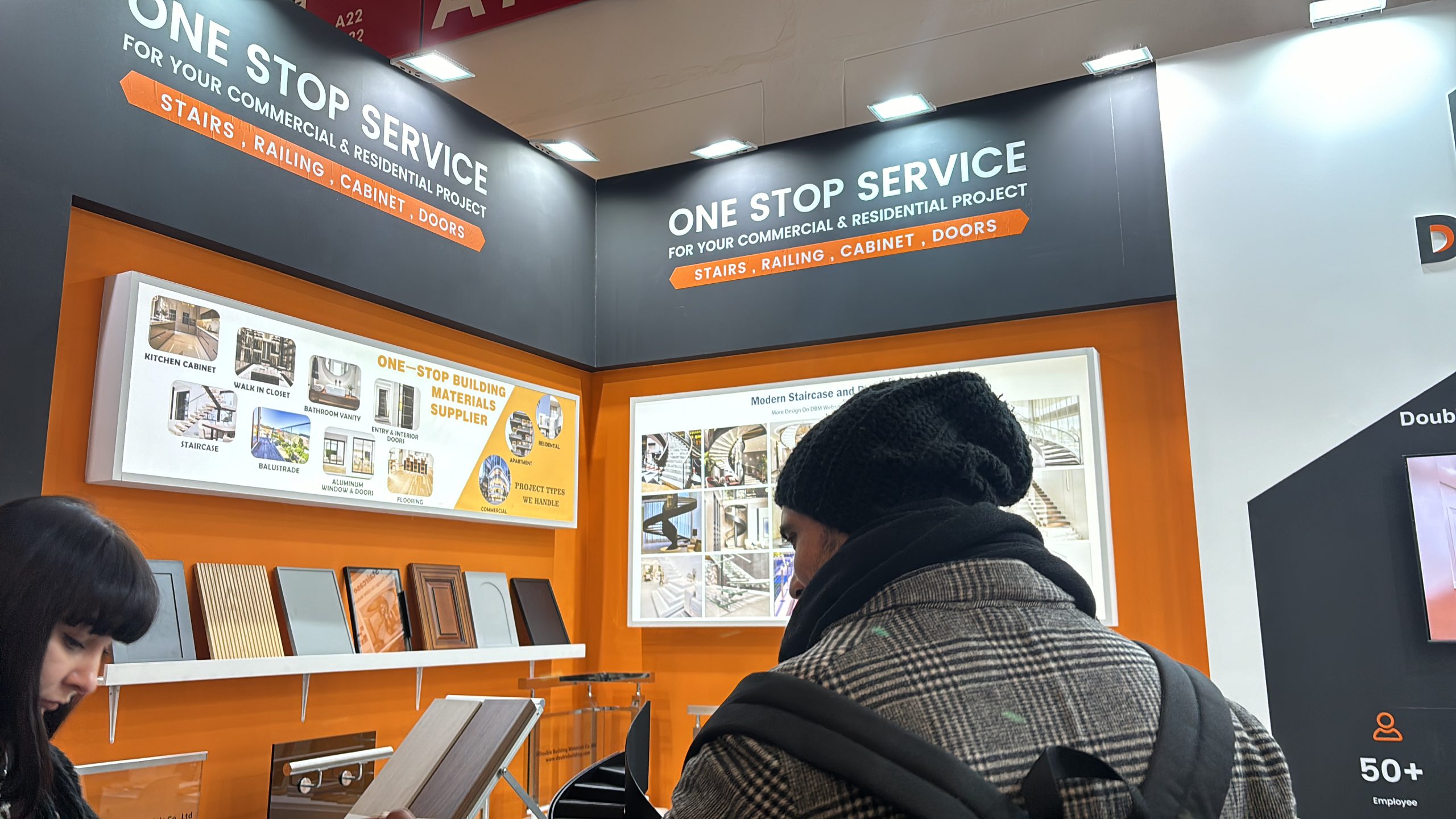 Double Building Materials team discussing DIN/EN staircase standards with European buyers at BAU 2025 Munich